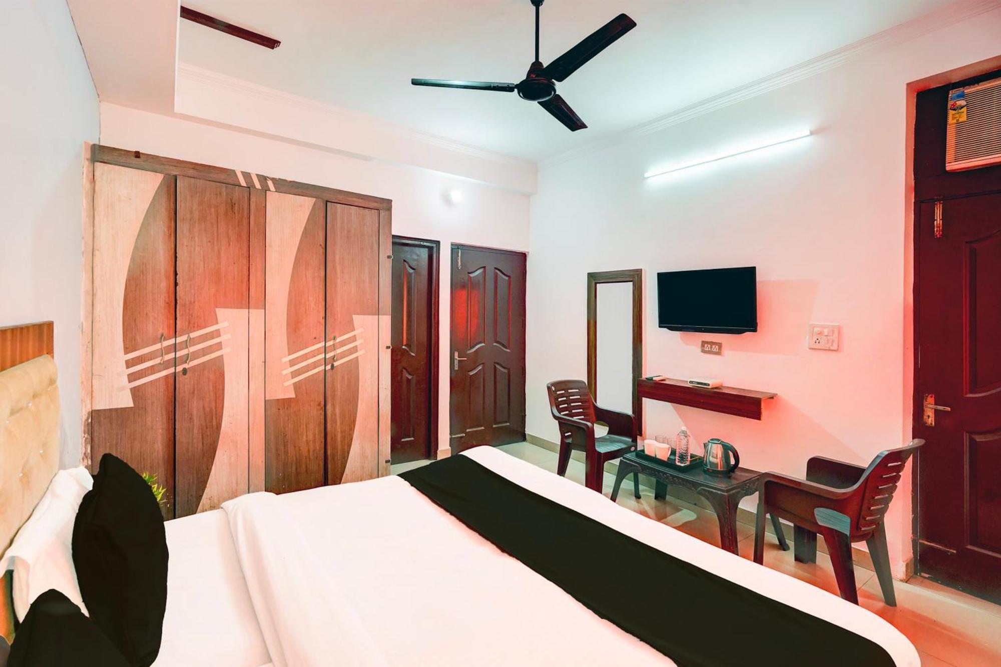 Super Hotel O Palm Дехрадун Экстерьер фото